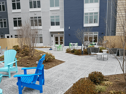 Collaborative Ancilliary Areas Adirondack chair patio outdoor office stack sling chair outside patios rooftops