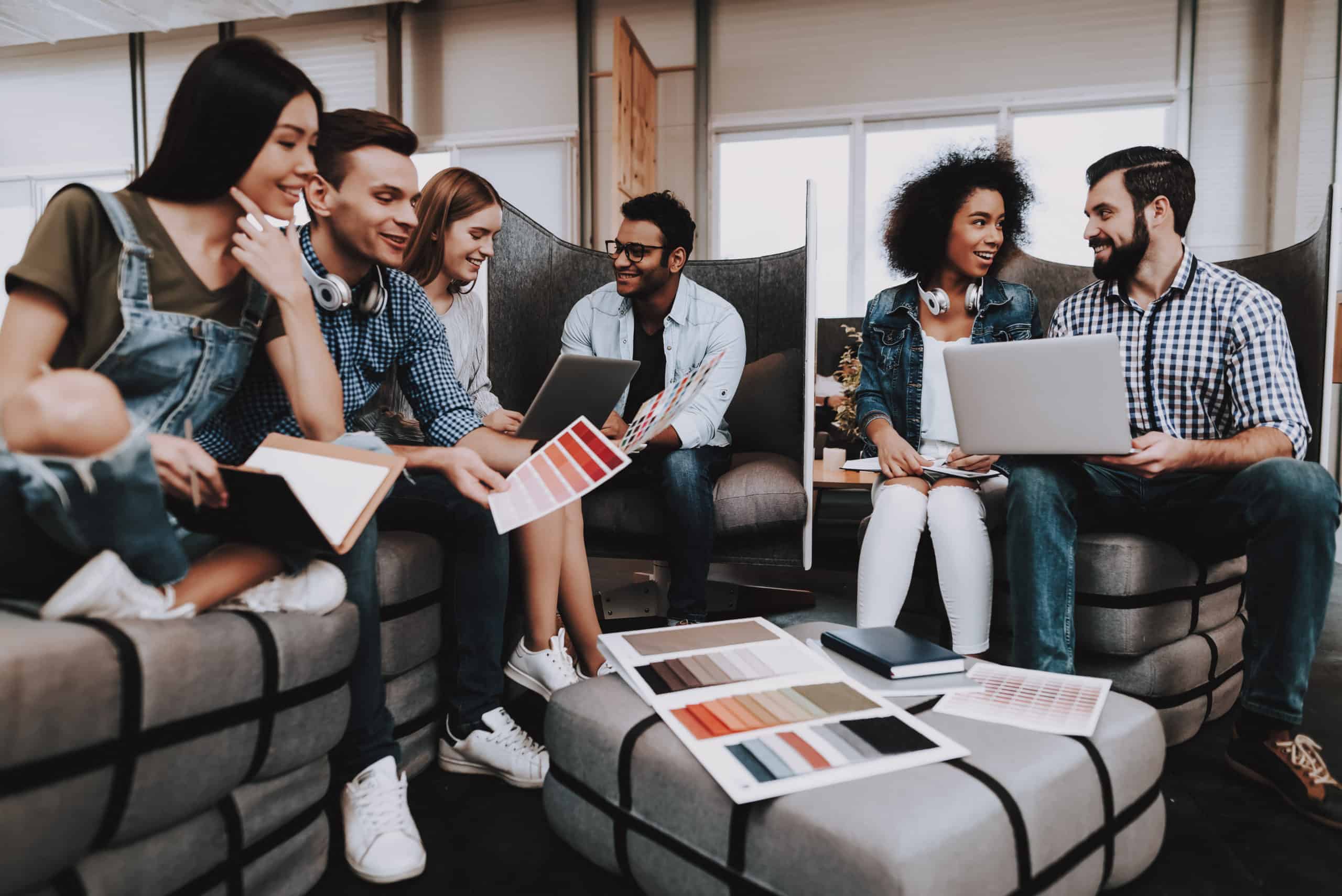 office workers collaborating on resimercial furniture