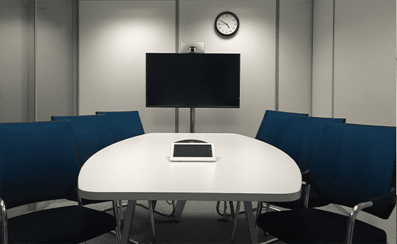 Conference room table and chairs with tv